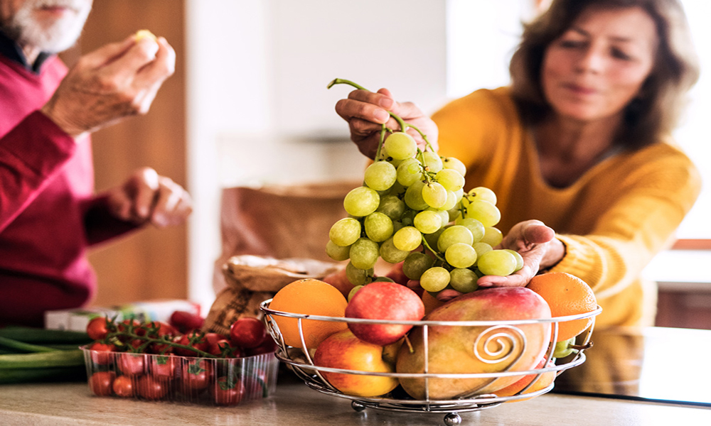 woman fruit kitchen