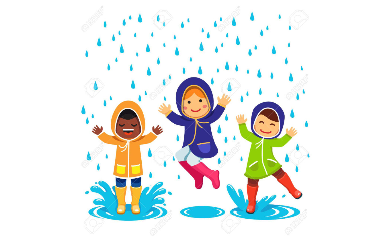 46283838 kids in raincoats and rubber boots playing in the rain children jumping and splashing through the pu