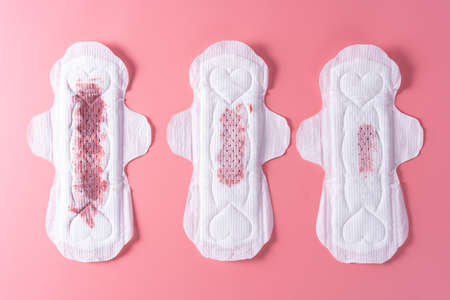 163524151 set of different used sanitary pad sanitary napkin on pink background menstruation feminine