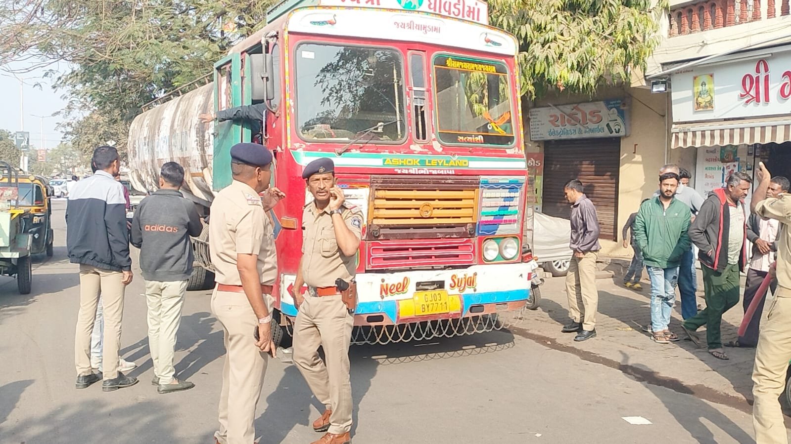 Father and son die after tanker hits bike