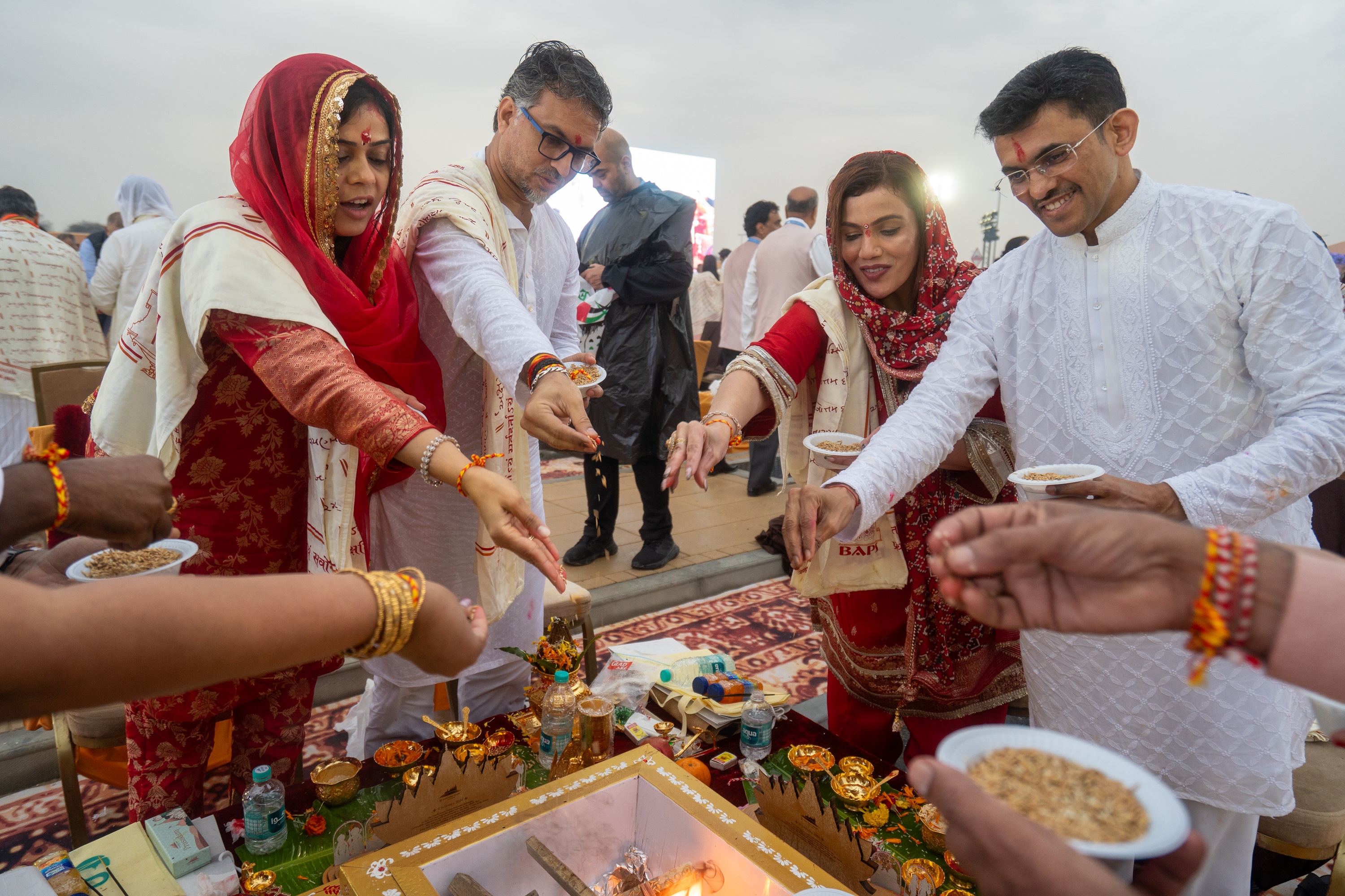 Family members performing Yagna rituals