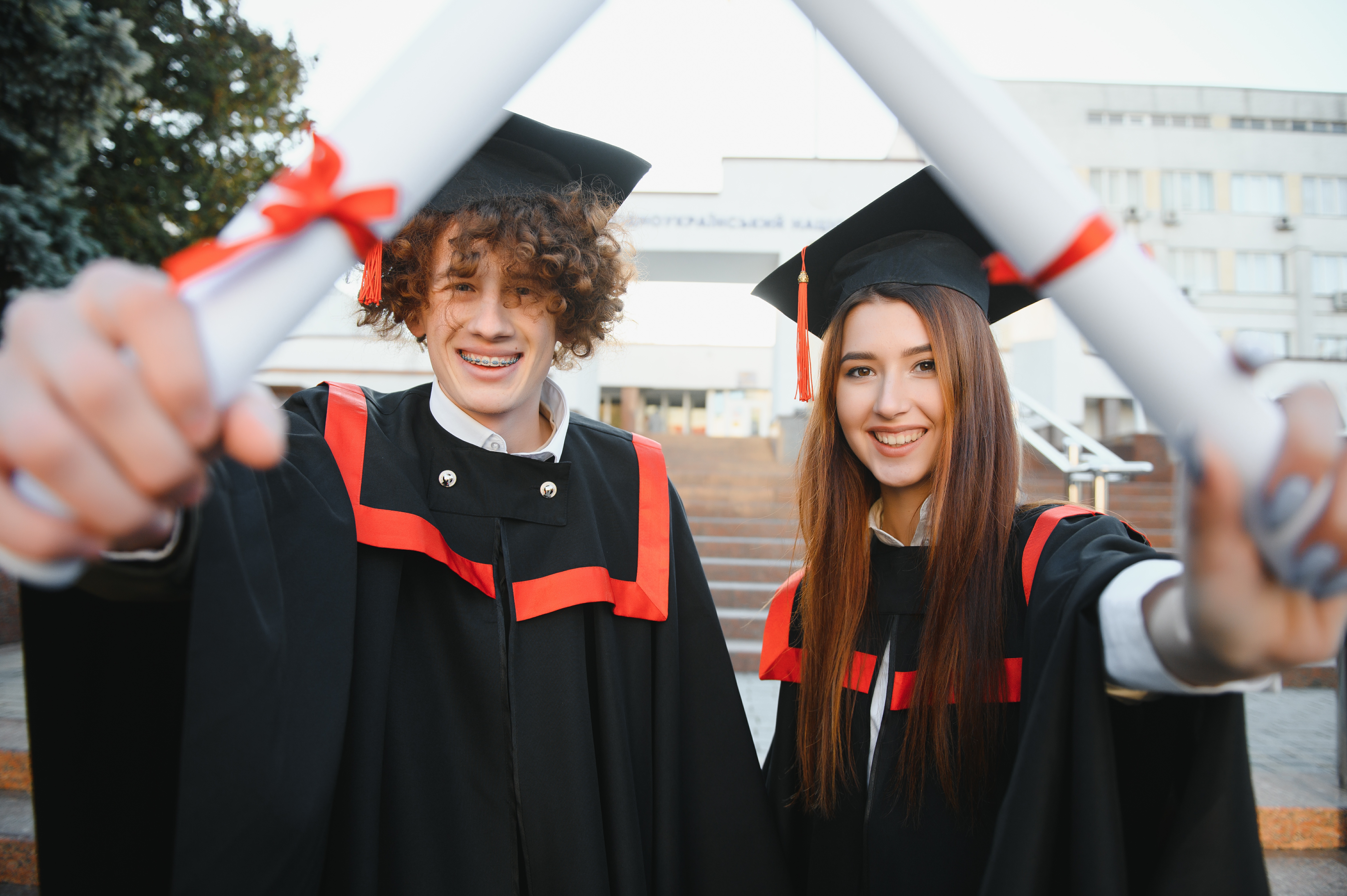 happy friends on graduation day portrait of two c 2024 01 23 16 40 28 utc 2