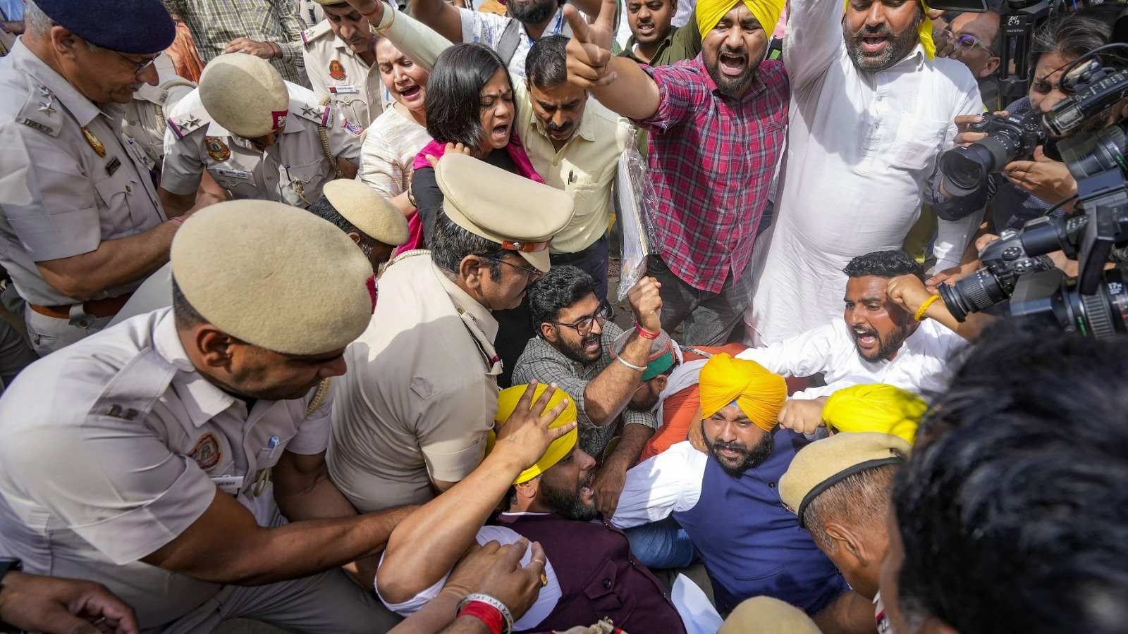 AAP's protest continues in Delhi, Punjab Minister Harjot Singh Bains detained