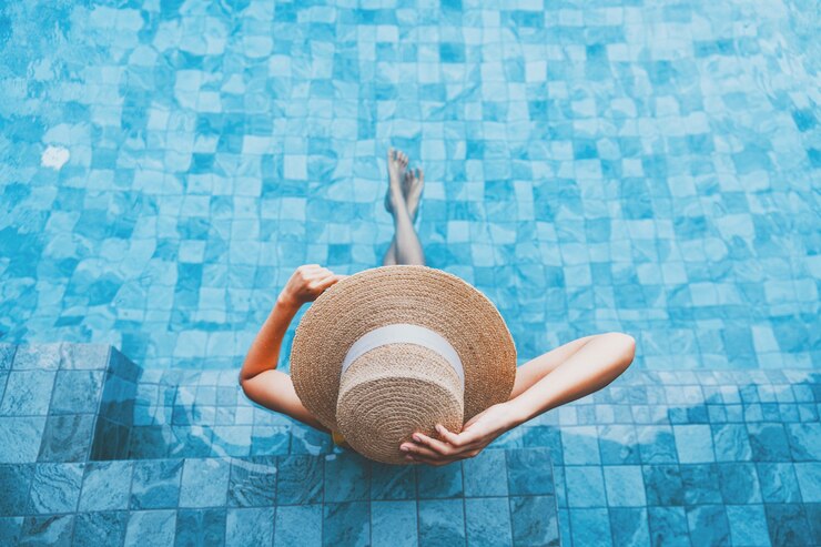 summer travel vacation concept happy traveler asian woman with hat bikini relax luxury infinity pool hotel resort day phuket thailand 64030 862