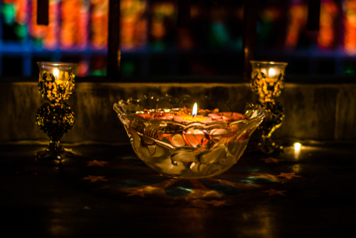 Diya in a glass vessel